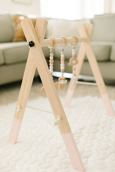 Wooden Baby Gyms + hanging toys
